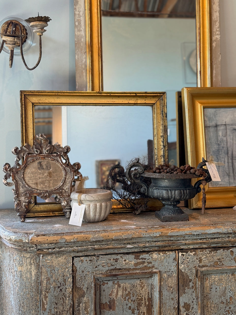 Miroir ancien français doré à patine vieillie